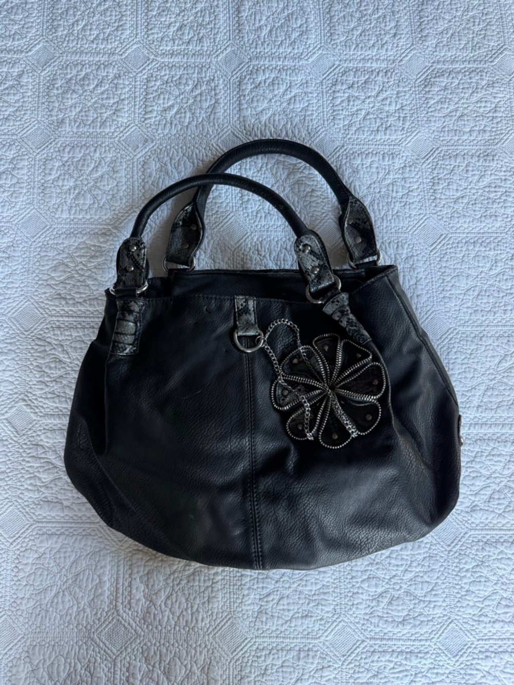Vintage Black Leather Tote Handbag with Decorative Charm